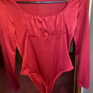 red bodysuit